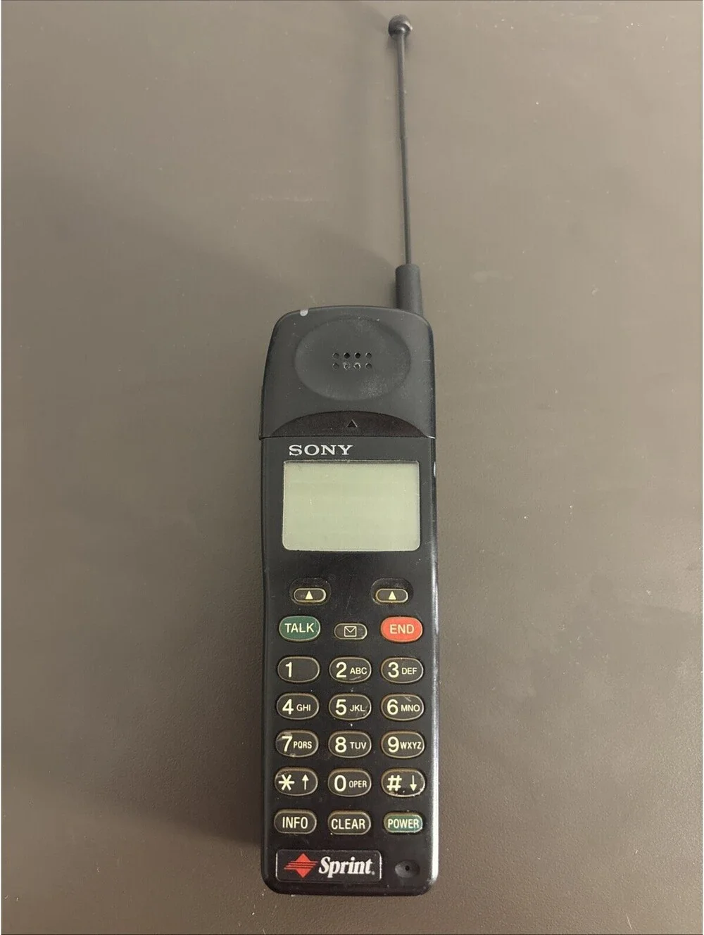 Vintage Sony CM-D600S Flip Up Top Candy Bar Cell Phone Sprint - Untested